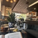Cozy interior of a local Burlington County coffee shop with seating, warm lighting, and a welcoming café atmosphere.