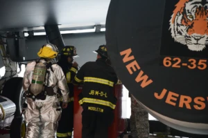 NASA Goes to the Moon. Burlington County Helps Bring Them Home. 3 Military fire and rescue personnel conduct aircraft emergency training at Joint Base McGuire-Dix-Lakehurst in New Jersey.