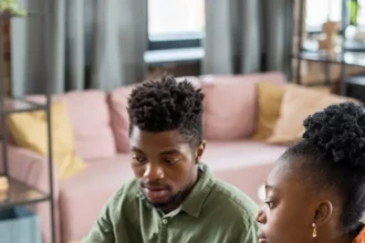Couple reviewing tax paperwork at home in Burlington County NJ