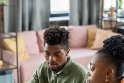 Couple reviewing tax paperwork at home in Burlington County NJ