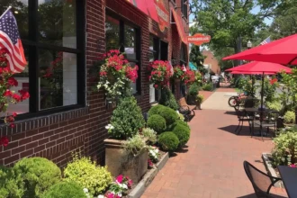 Main Street Moorestown NJ with outdoor dining, brick sidewalks, and storefronts
