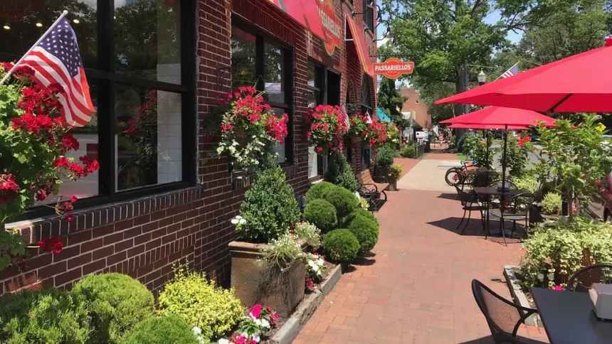 Main Street Moorestown NJ with outdoor dining, brick sidewalks, and storefronts