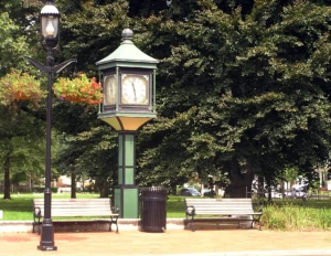 Town clock and benches in a Moorestown NJ park setting